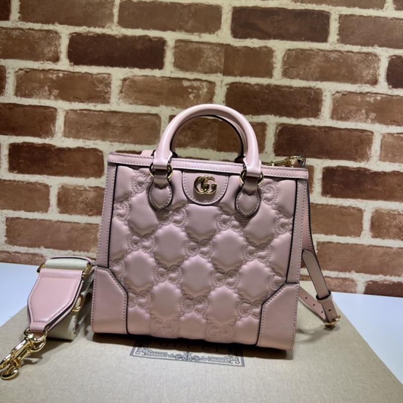 G*u*i top handle bags